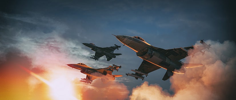 A group of fighter jets flying in the sky